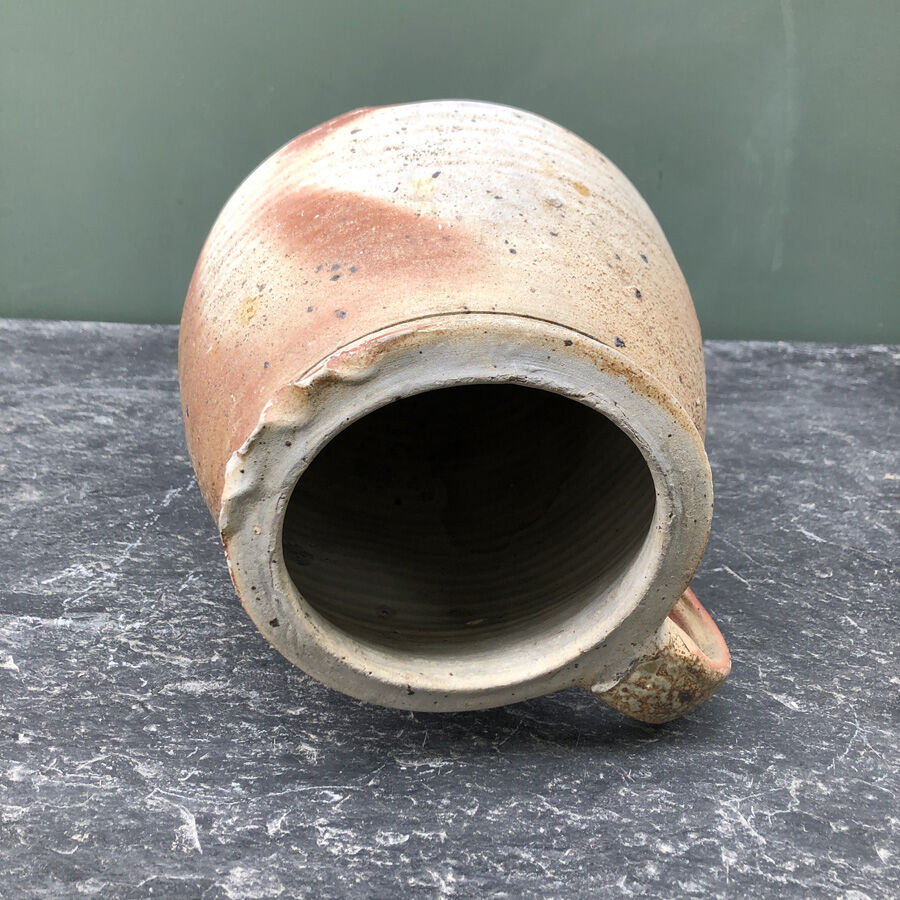 Old pot in glazed sandstone