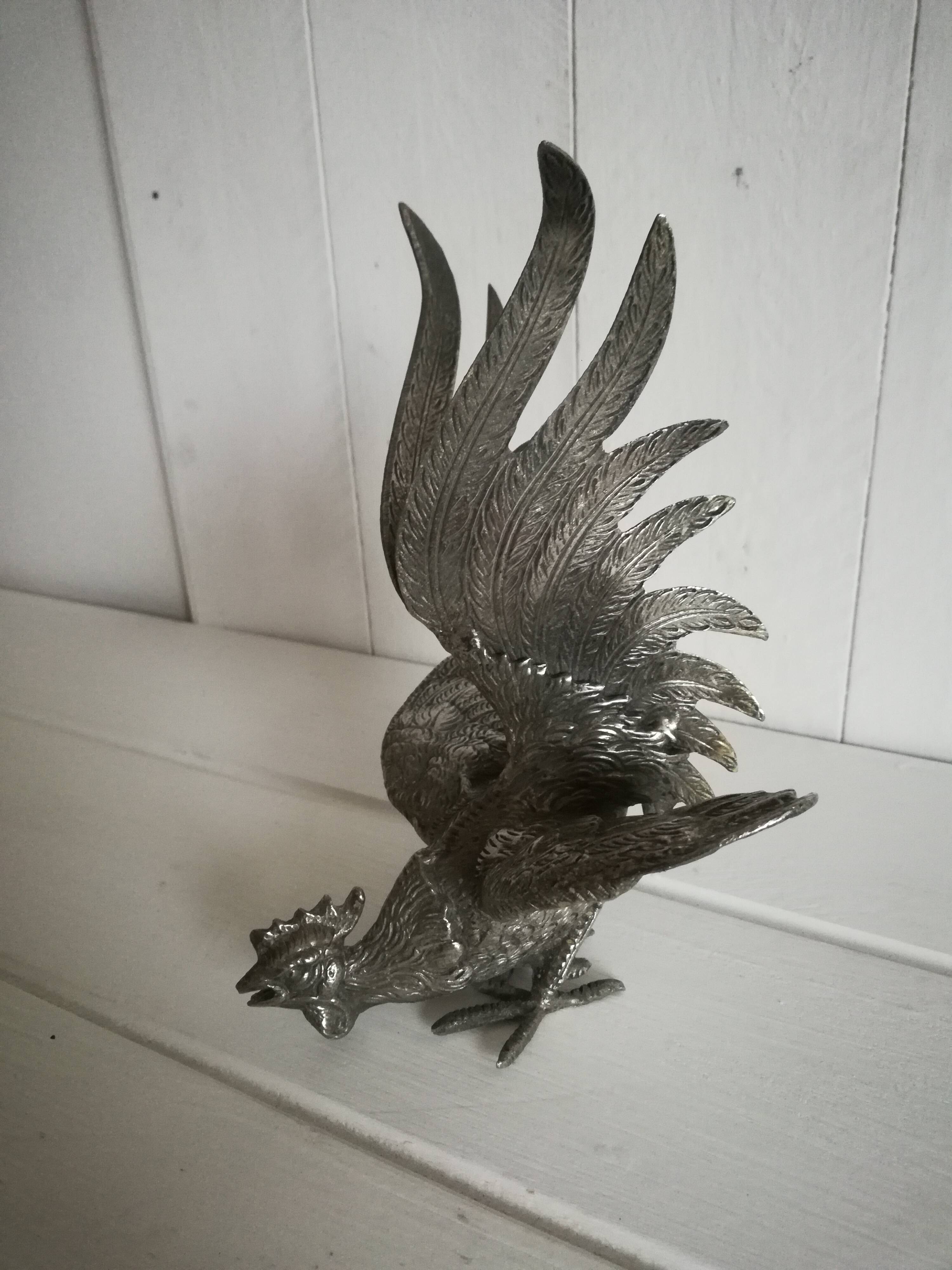 Silver metal rooster / Greenhouse book