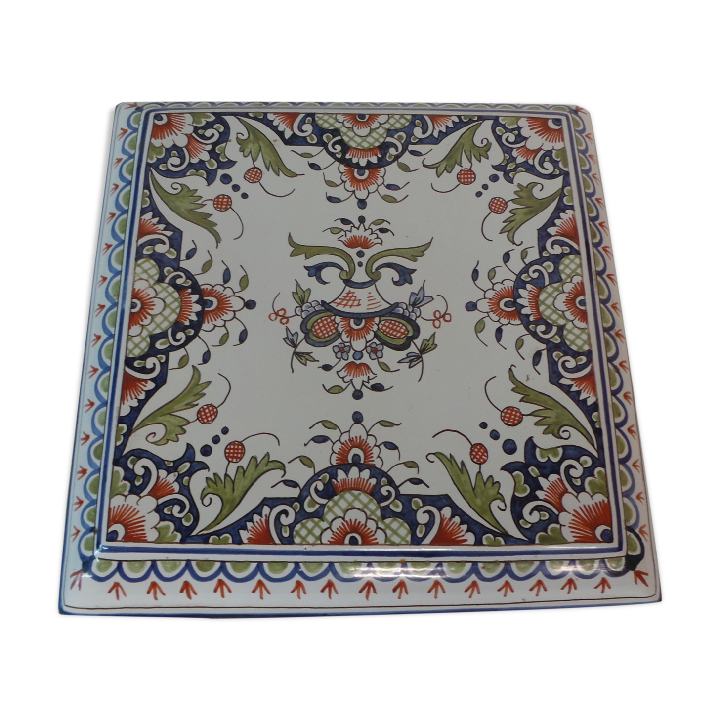 Table mat of rouen faience hand-painted floral decoration