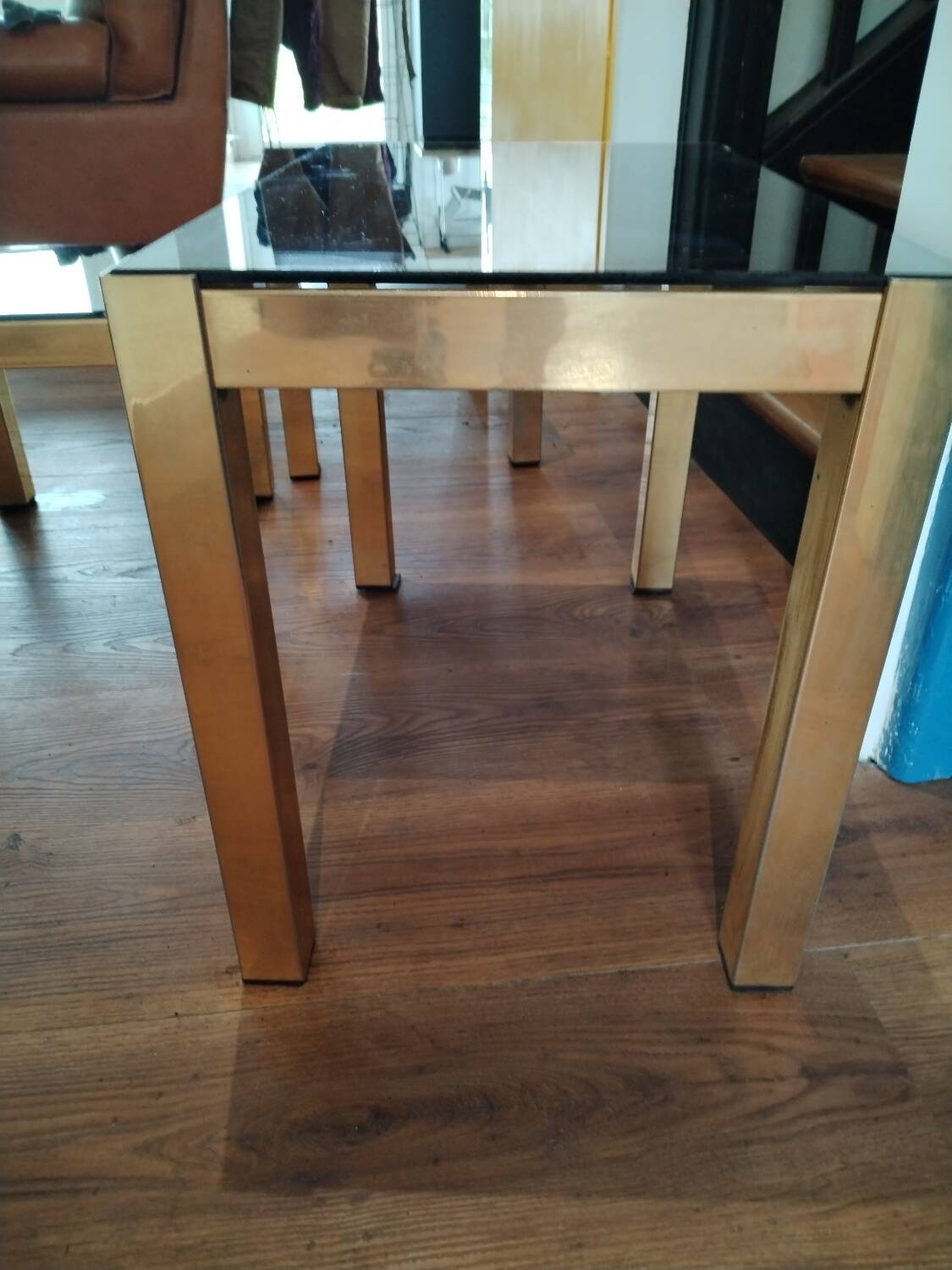 Vintage nesting table in gold metal and smoked mirror glass