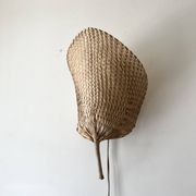 Woven rattan wall light in the style of Igno Maurer, design from the 1970s.