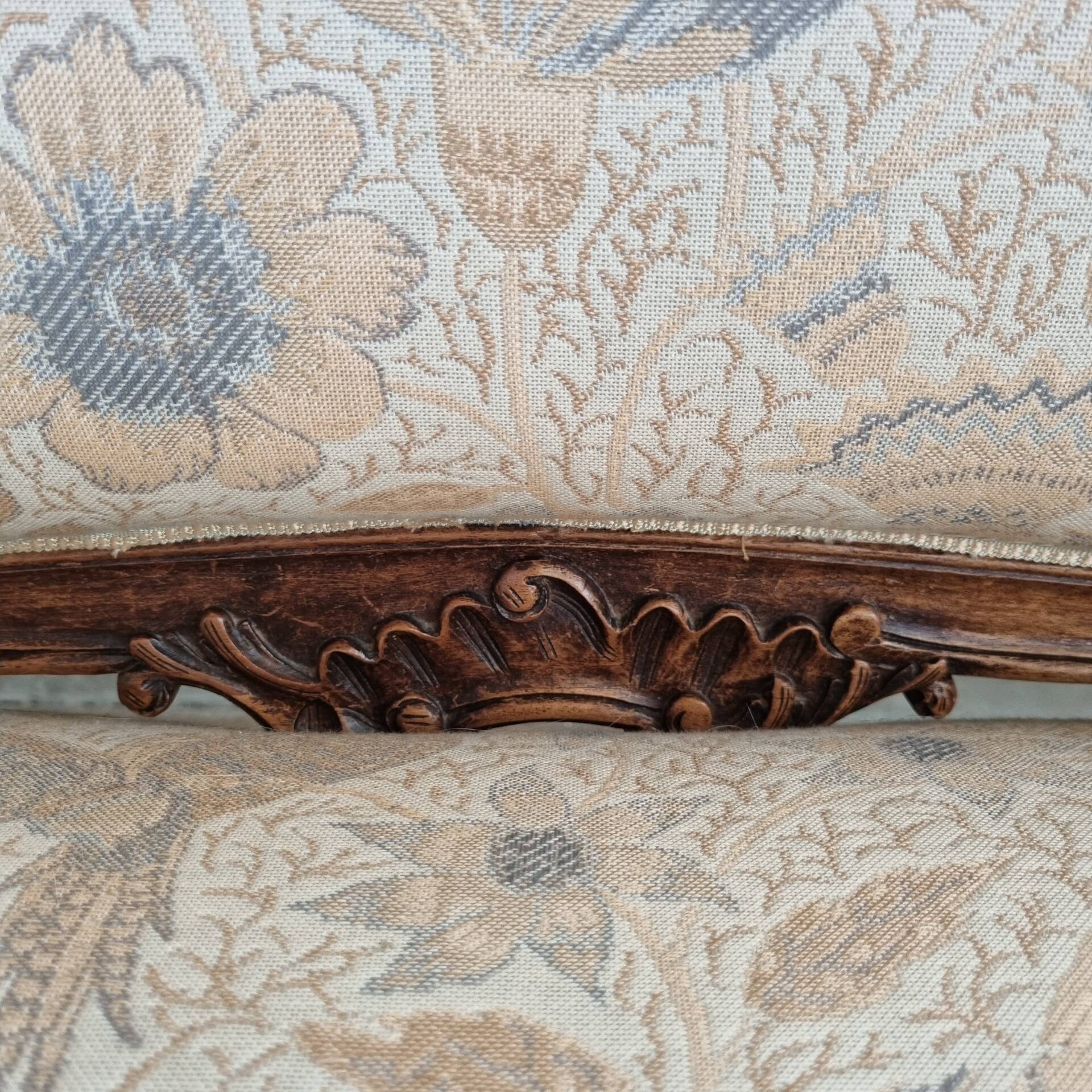 Small sofa or bench in Louis XV style, rococo.