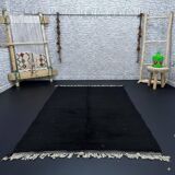 Simple black handmade wool rug 250cm x 150cm