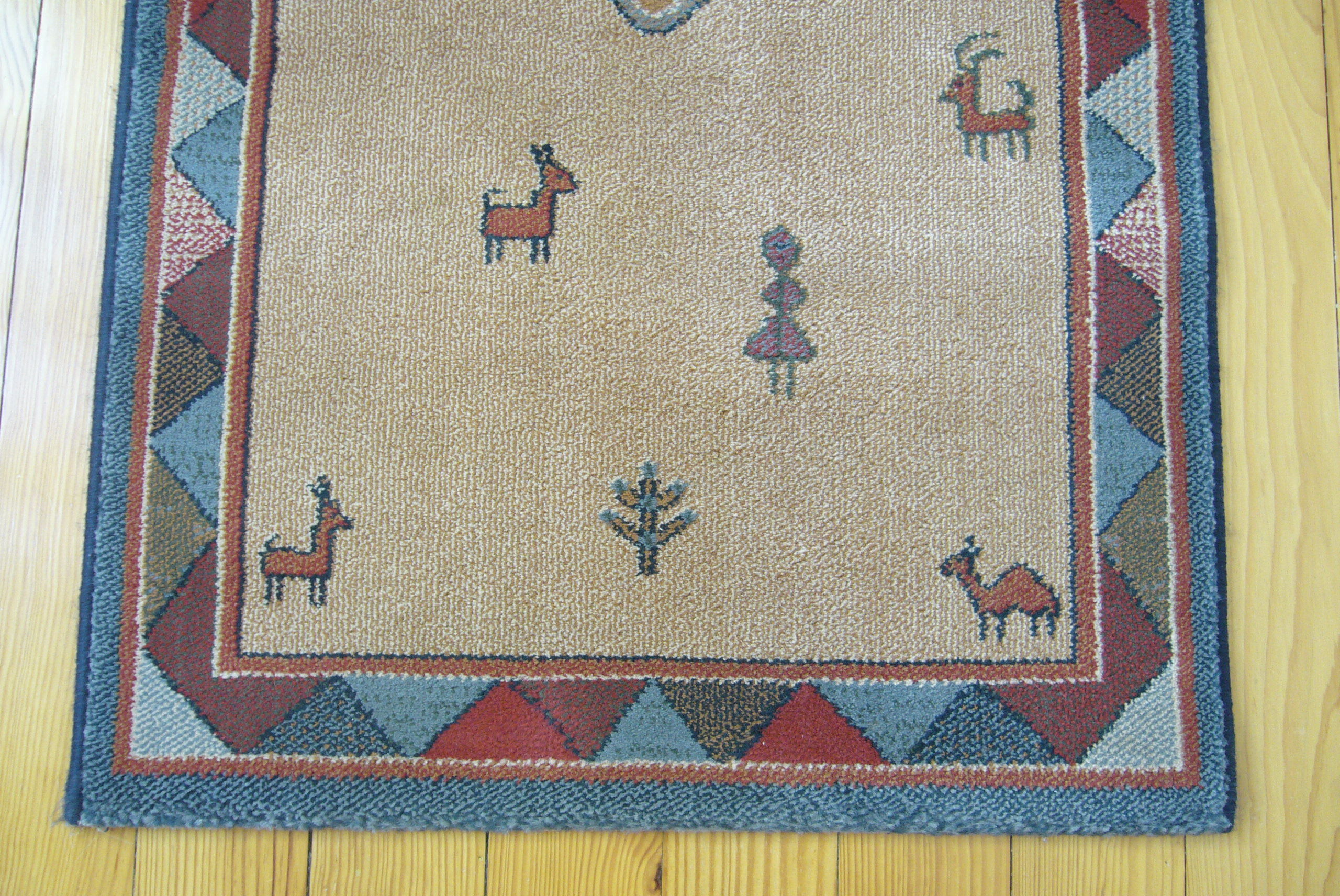 Pair of 60 x 120 Peruvian wool rugs