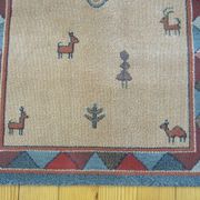 Pair of 60 x 120 Peruvian wool rugs