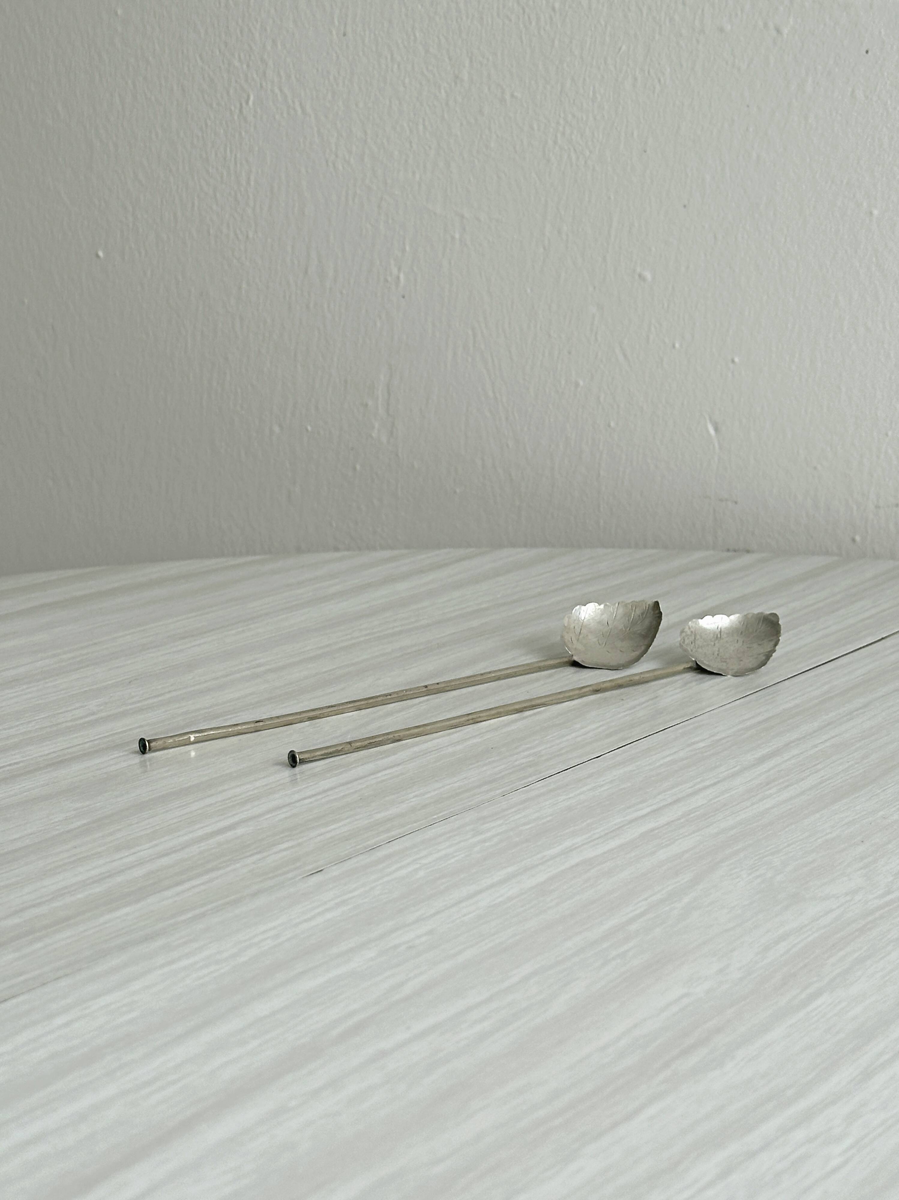 Pair of vintage silver leaf mixers