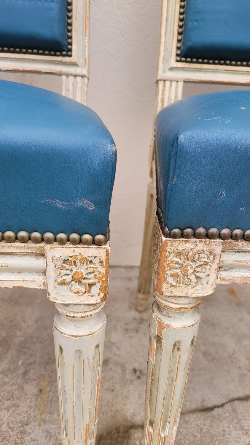 Pair of antique Louis XVI style chairs with patina