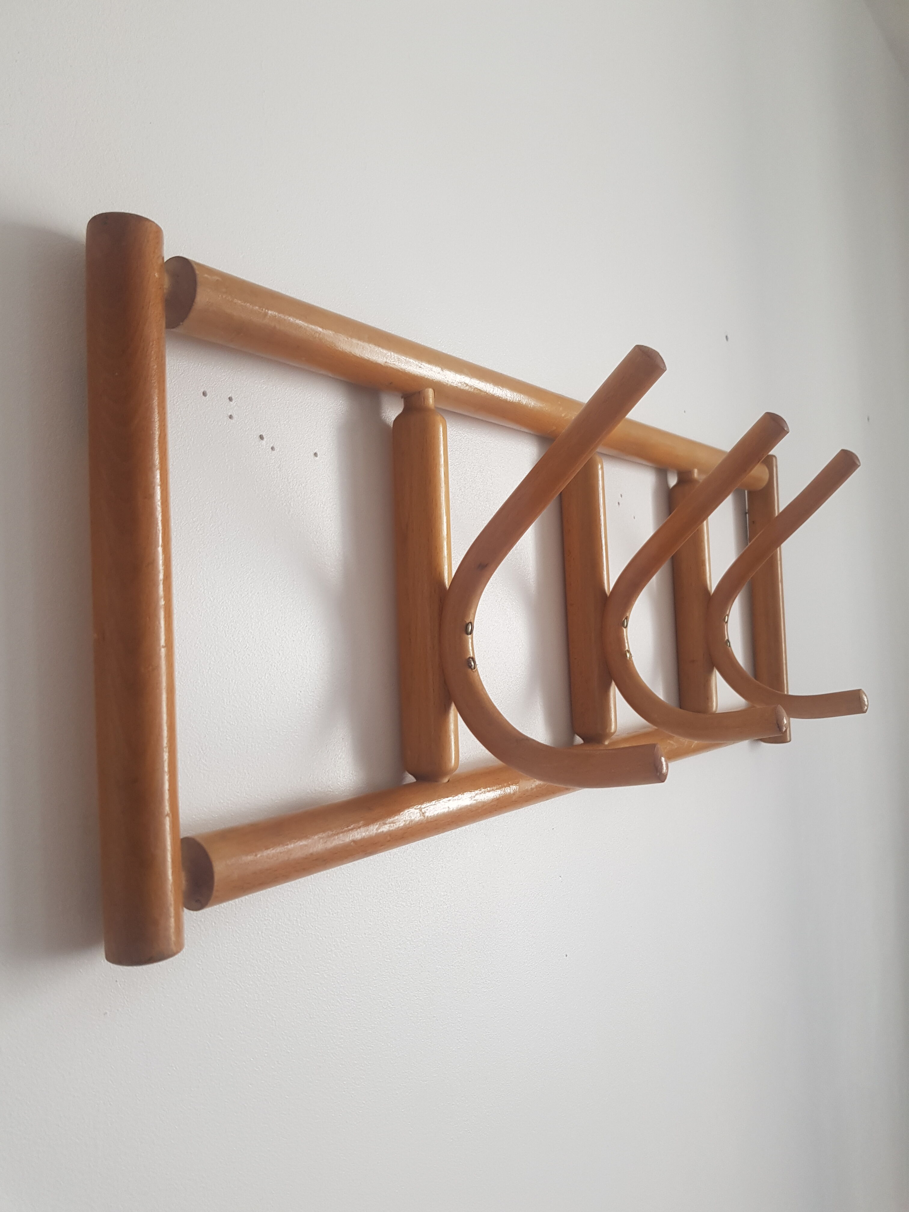 Wooden wall coat rack