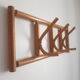 Wooden wall coat rack