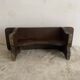 Old low stool made of solid wood