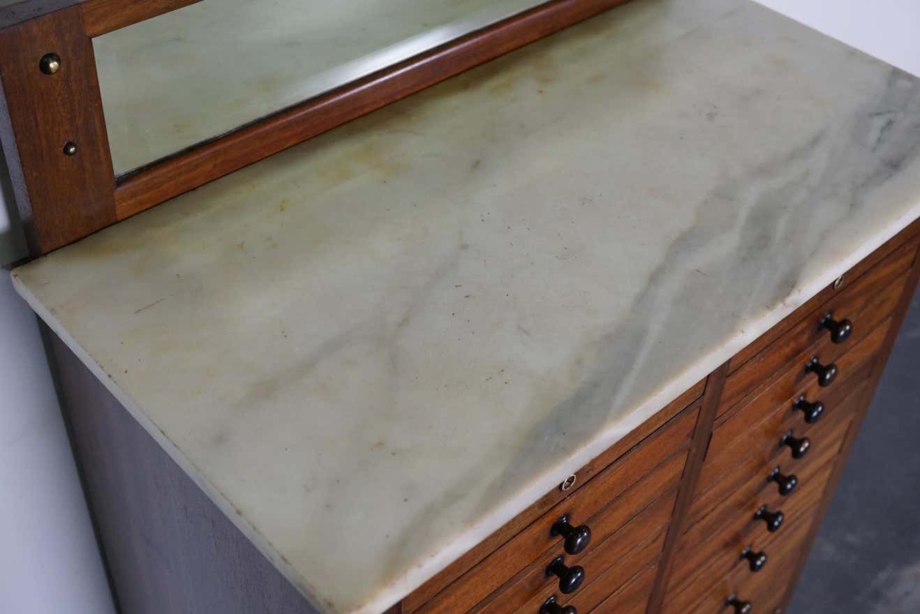 Antique dental practice in mahogany and marble Amsterdam around 1920