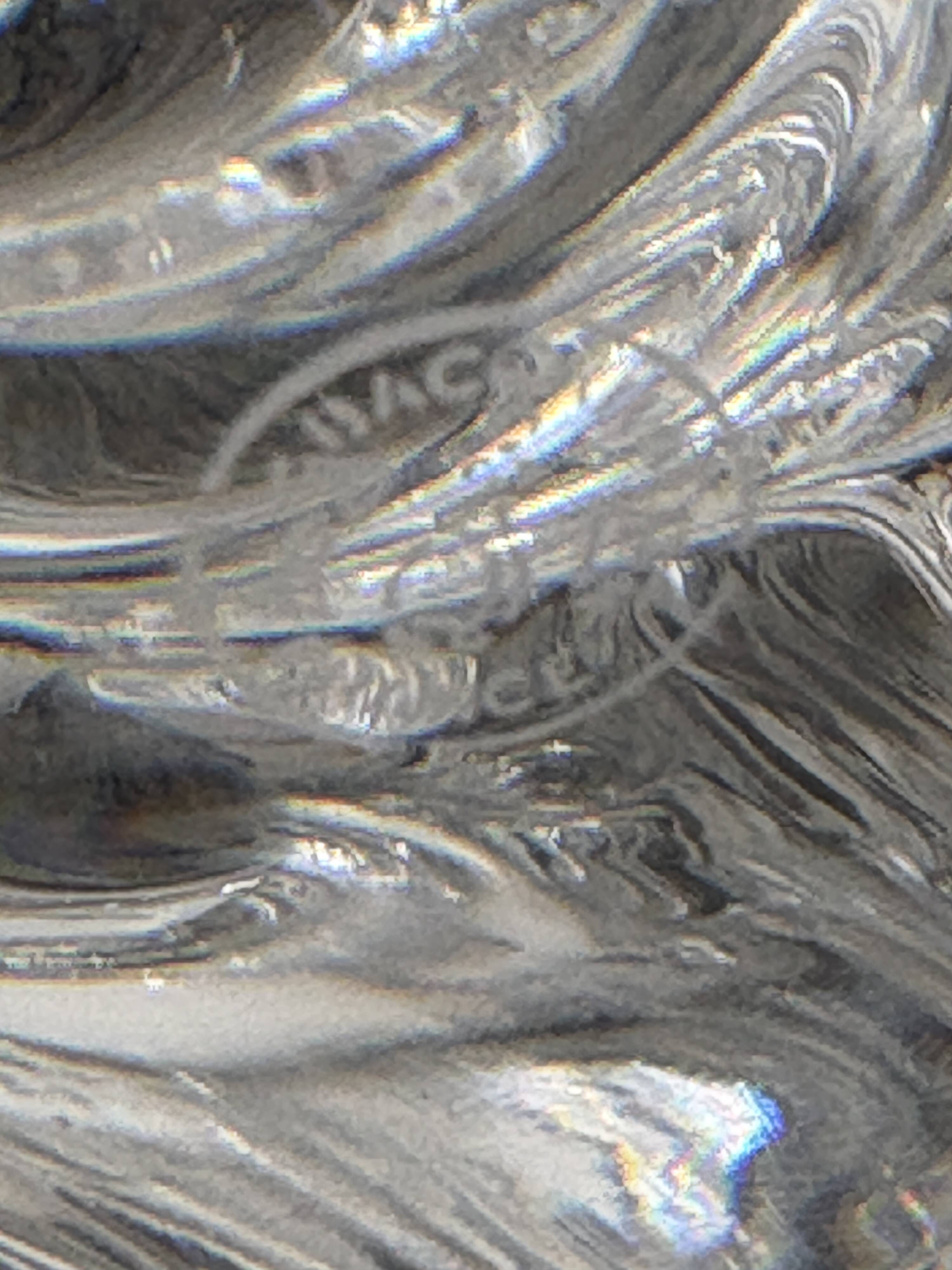 Pair of signed Baccarat Aladin candlesticks