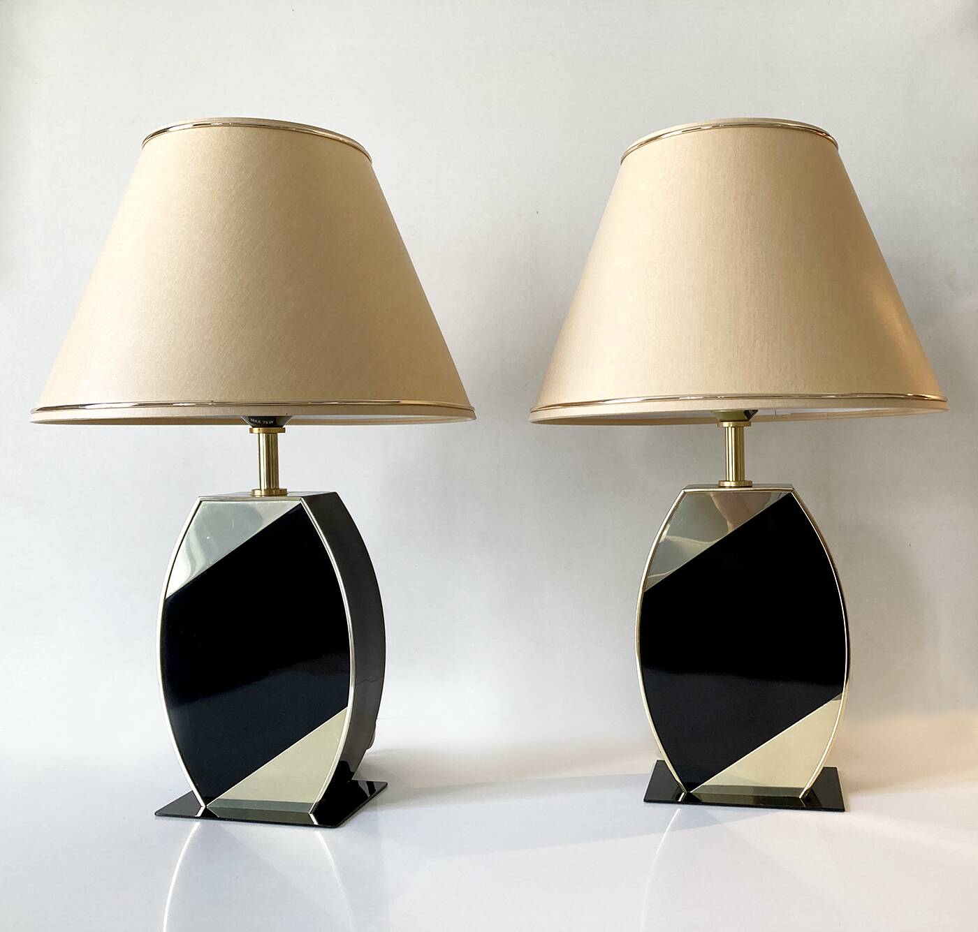 Pair of table lamps, the dolphin, black cream and gold 1970