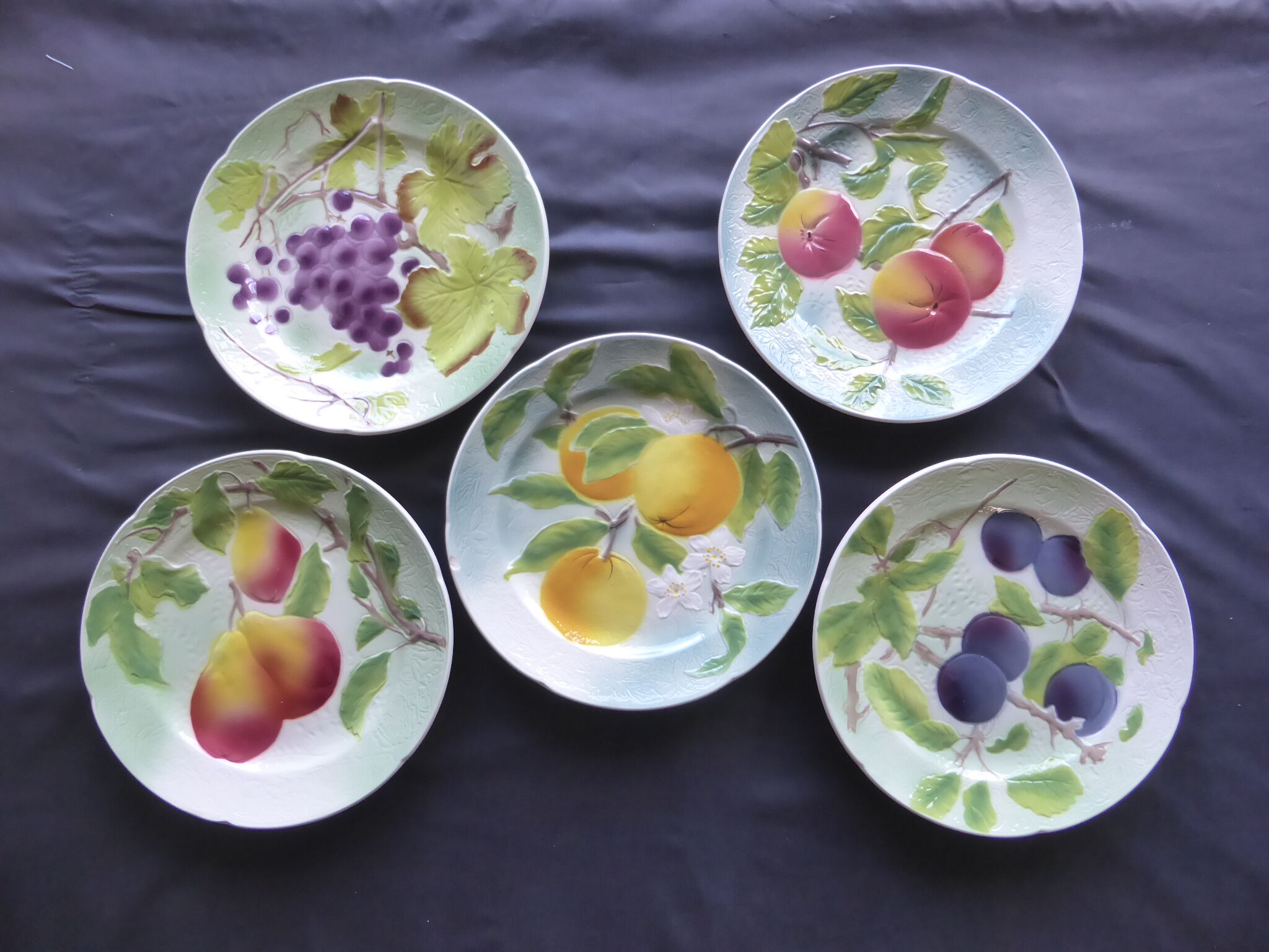 5 old dessert plates decorated with saint clement's dabbling fruit