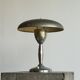 Patinated brass and chrome table lamp from the 1950s.