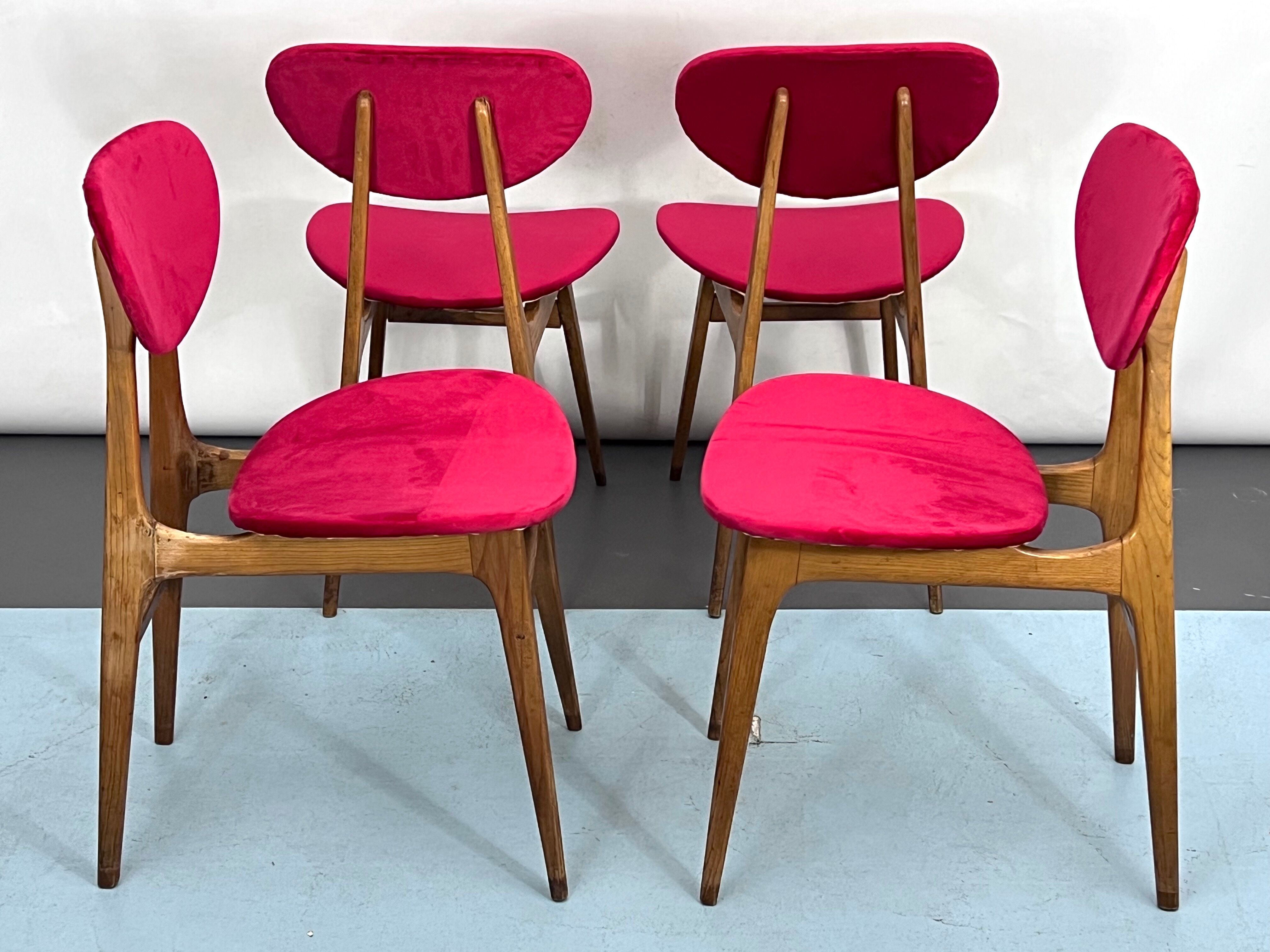 Set of four red velvet and wood dining chairs, Italy 1950