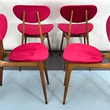 Set of four red velvet and wood dining chairs, Italy 1950