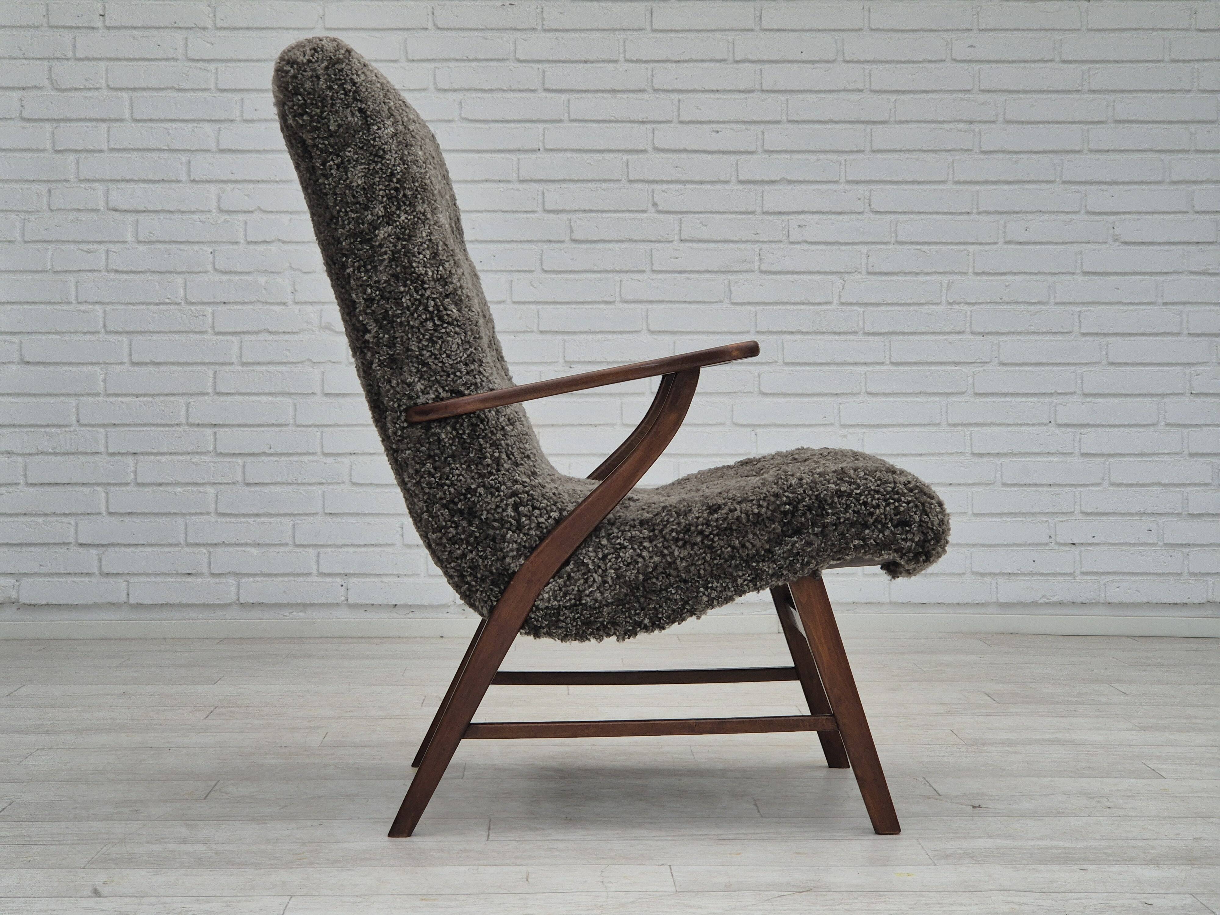 60s, Danish design, refurbished armchair, genuine sheepskin "Wellington".