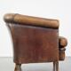 Characterful sheepskin leather club armchair with a luxurious, rustic appearance