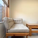 Two vintage Swedish sofas and a pine table