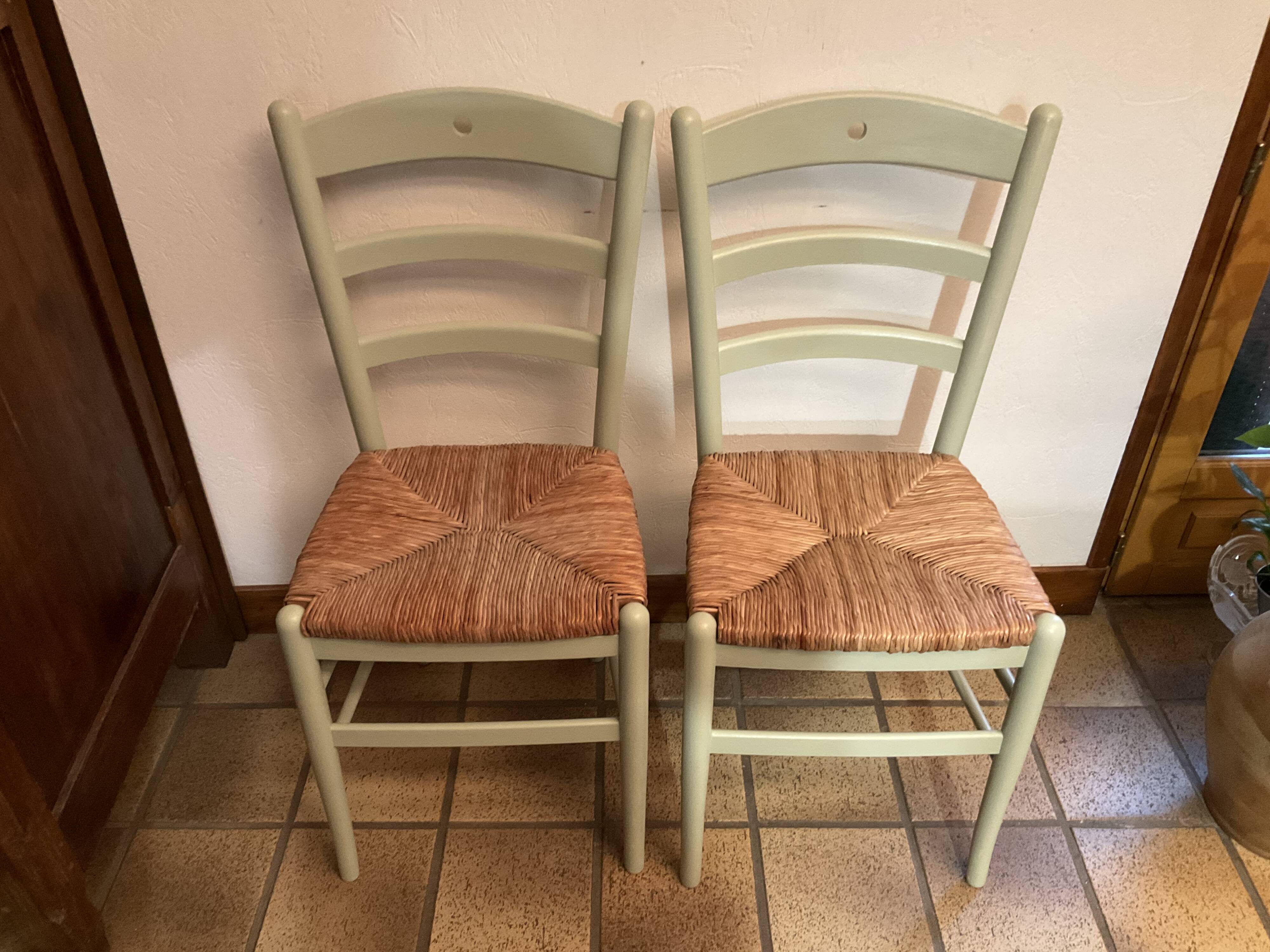 Pair of green straw sitting chairs