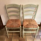 Pair of green straw sitting chairs