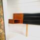 Mid century 1970s retro teak headboard with two hinged bedsides, upholstered in black by 'slumberlan
