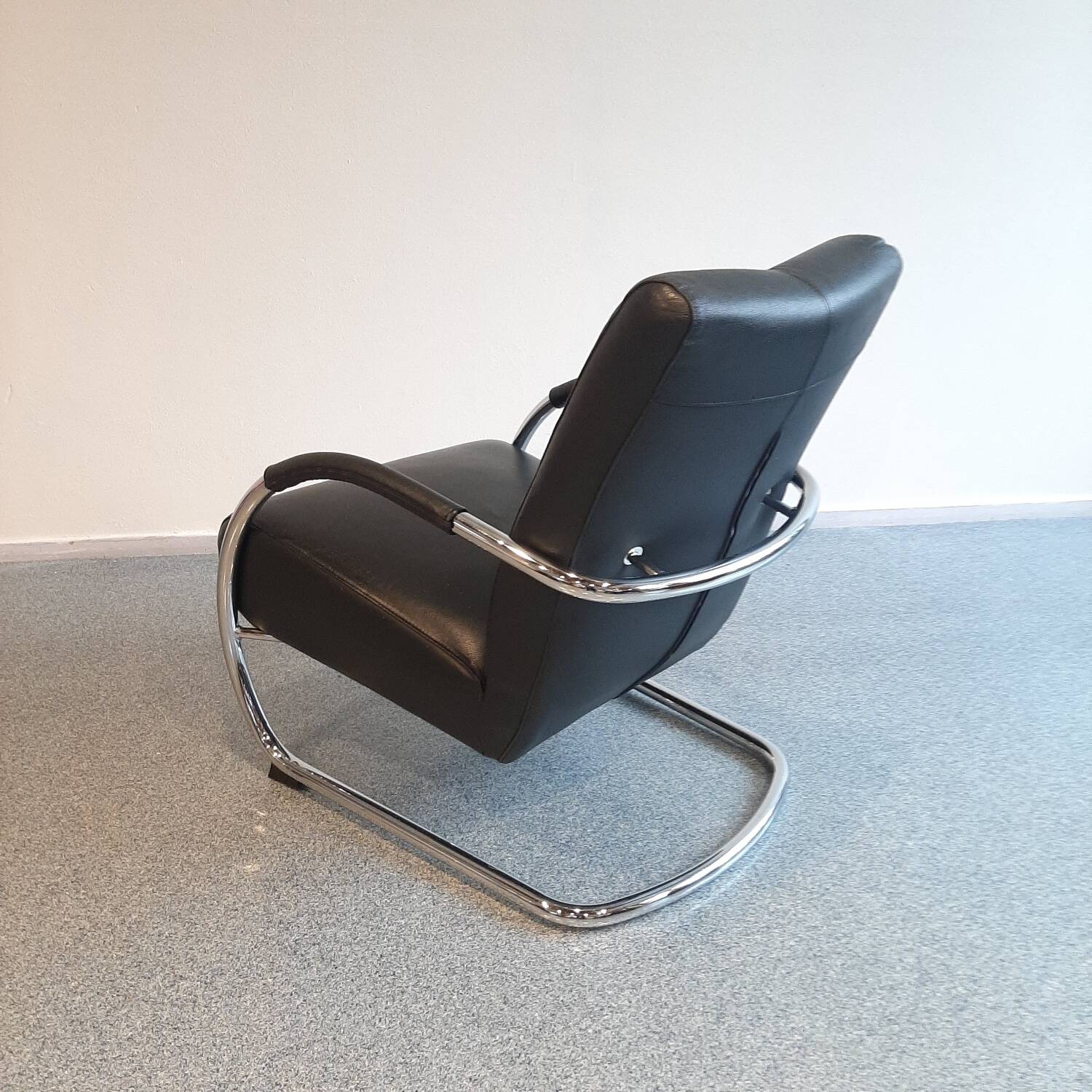 Pair of tubular armchairs