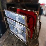 Magazine or vinyl holder in gold metal, 1960s