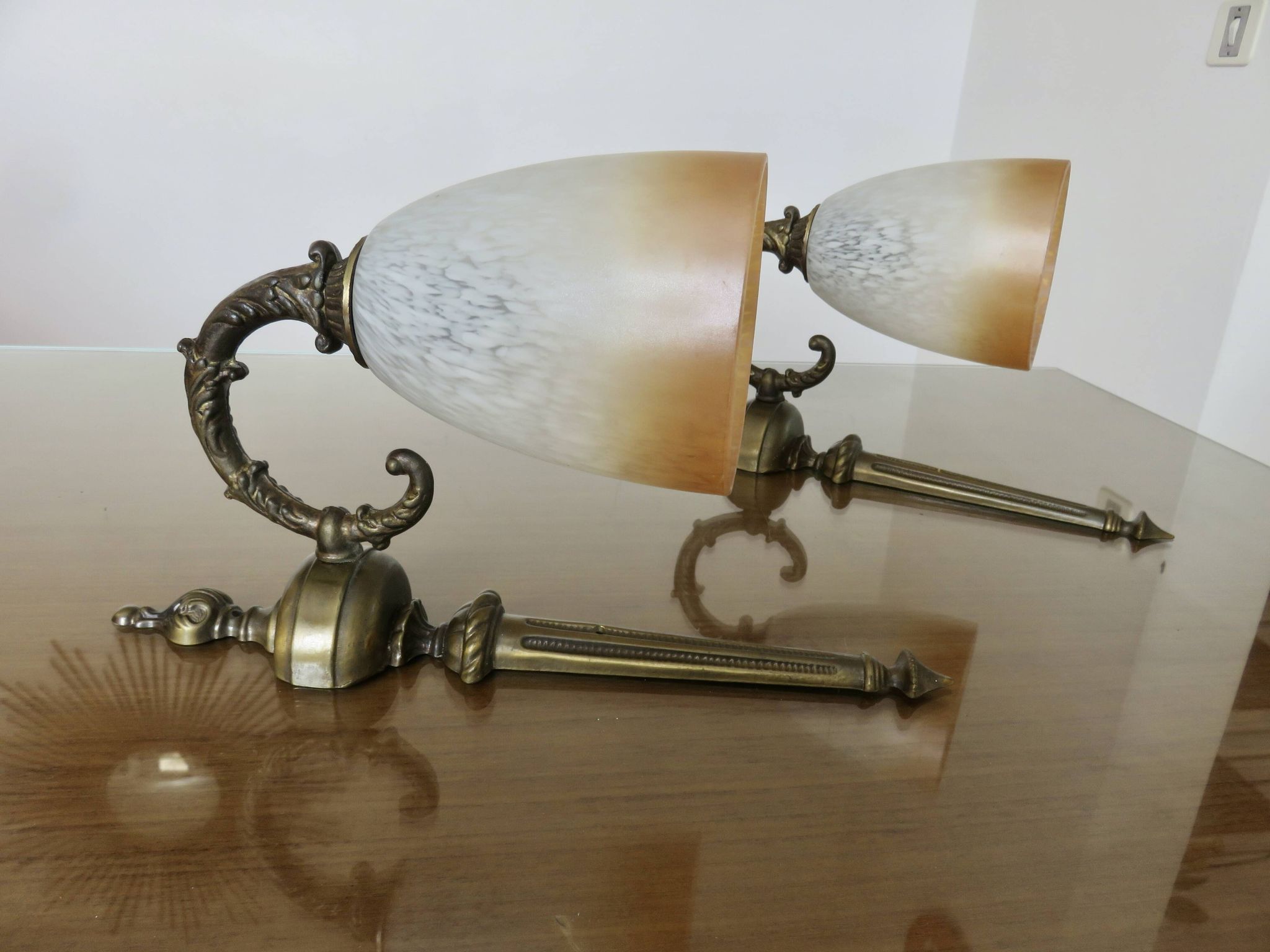 Pair of art deco wall lights in marbled glass and brass