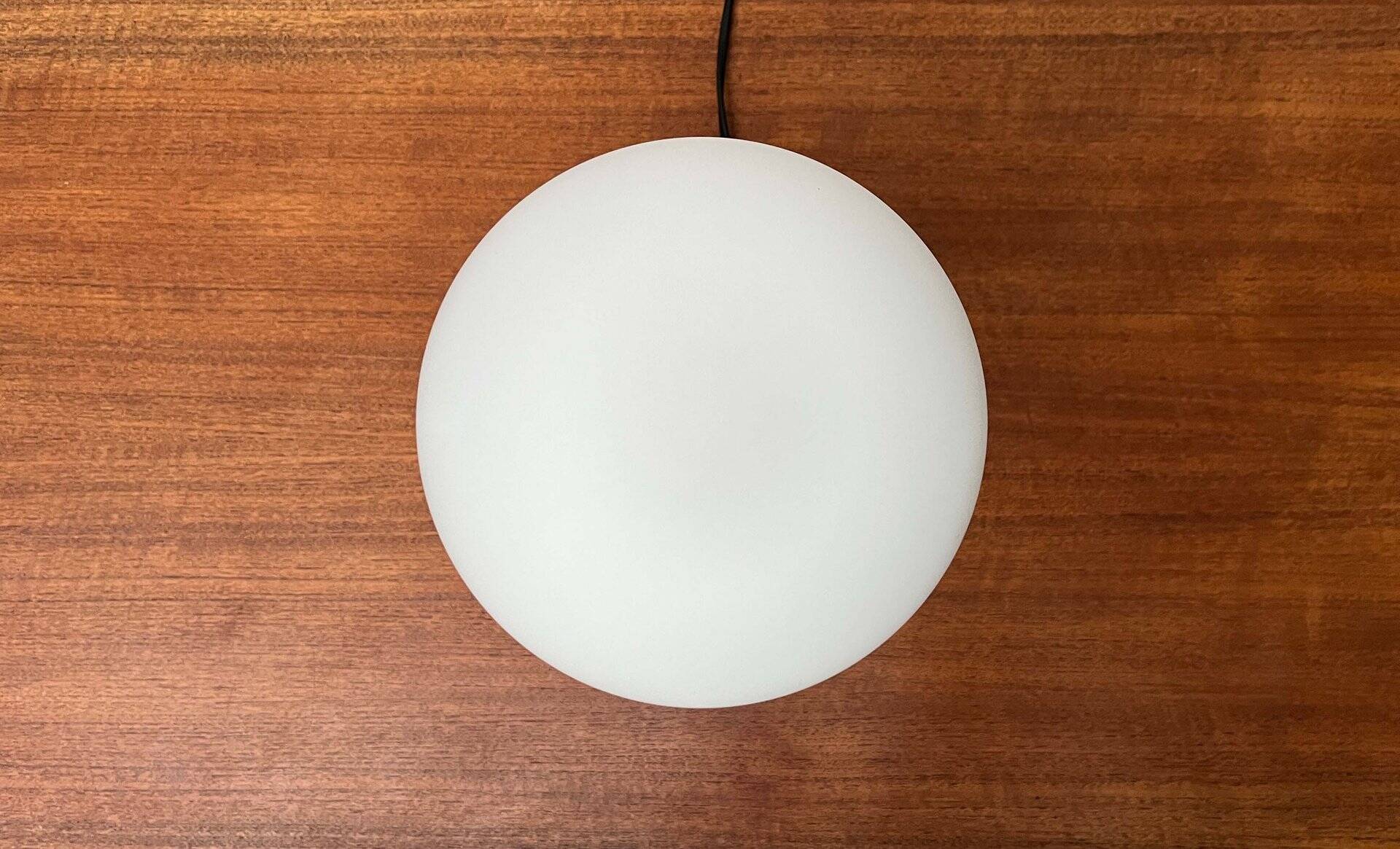 Pao T1 black table lamp, postmodern Italian model by Matteo Thun for Arteluce, 1990s.