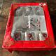 The service of 6 whiskey glasses with red flowers, with its bucket and its ice cube tongs.