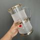 Vintage orangeade service in white granite glass and golden edging