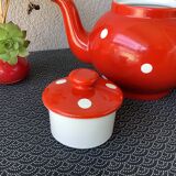 Vintage red teapot with white polka dots