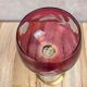 Antique fuchsia pink engraved glass – twisted stem