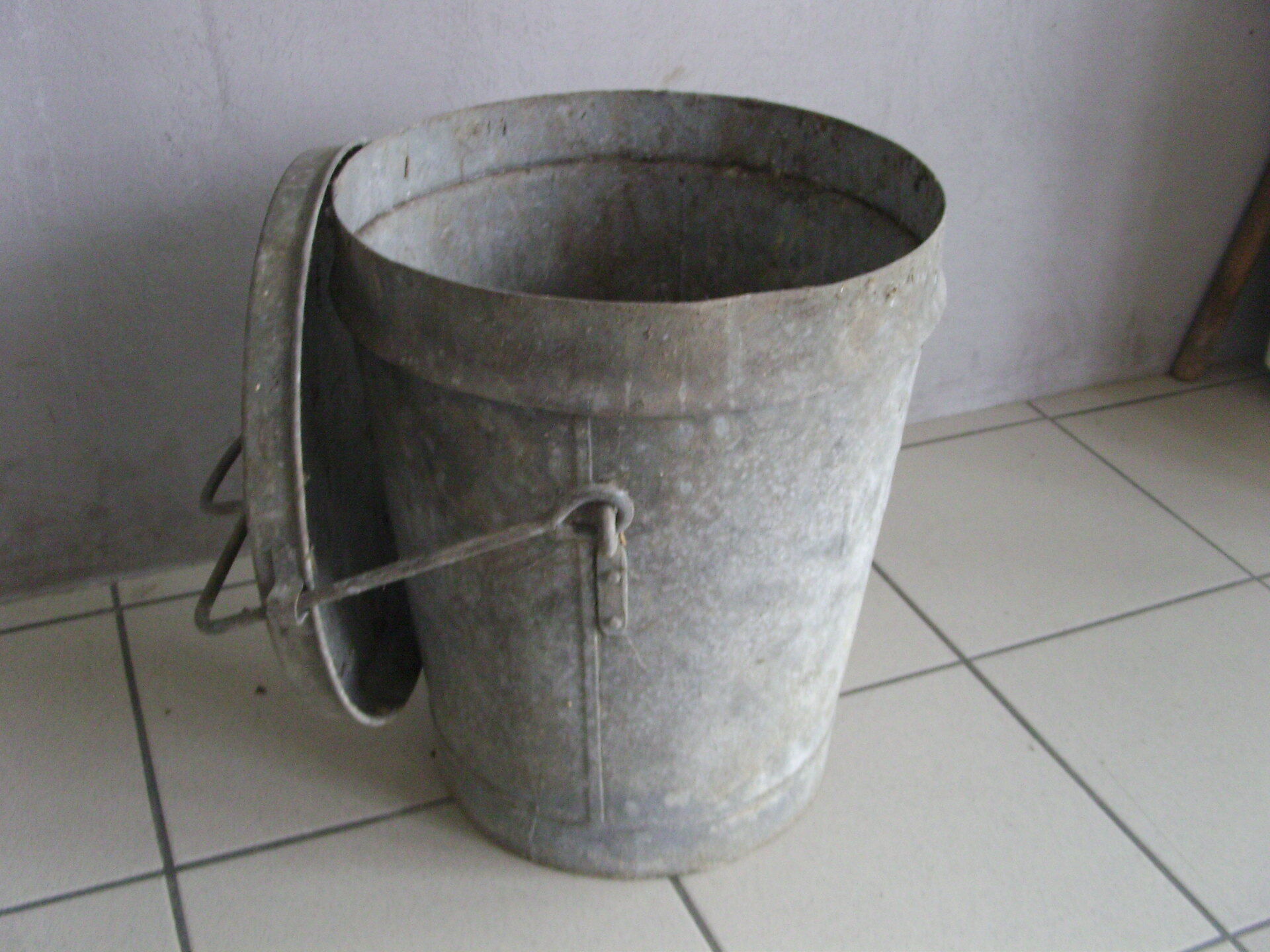 Old vintage garden zinc trash can