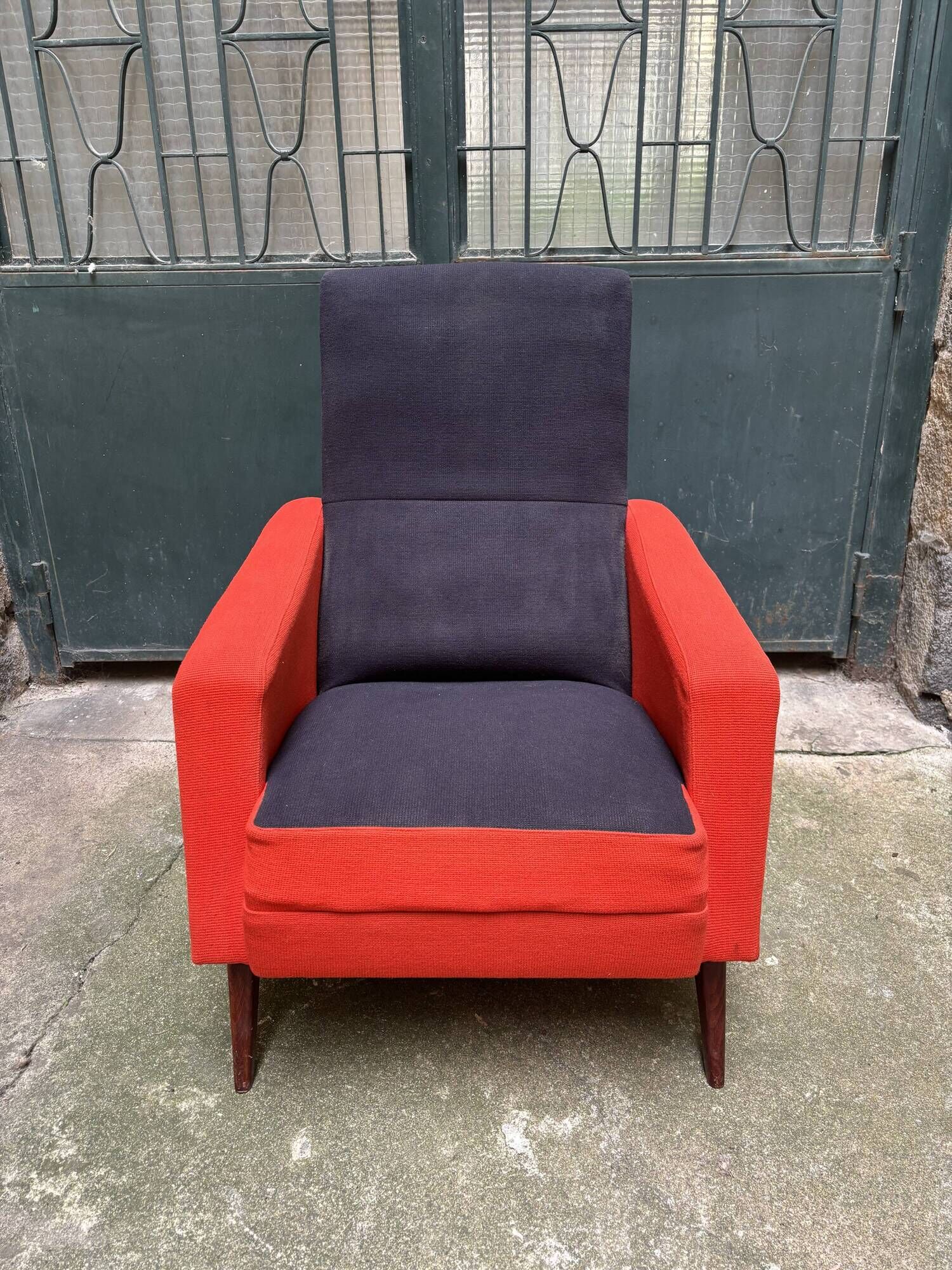 Pair of vintage black and red armchairs from the 1960s.