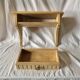 Old small hanging shelf in solid wood