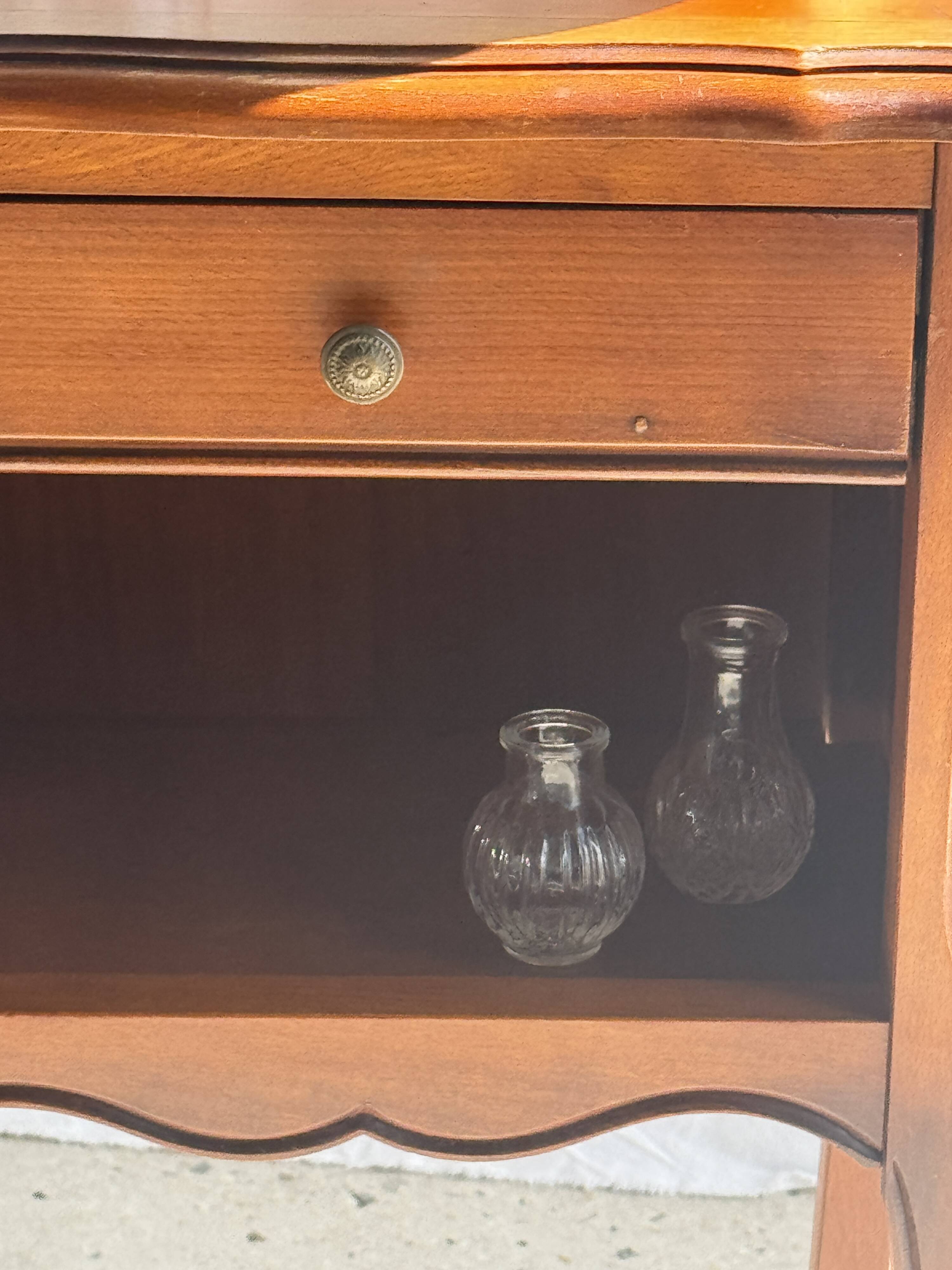 Classic wooden bedside table with drawer