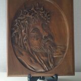 Face of Christ carved on wood