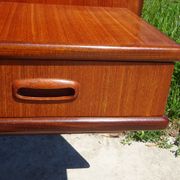 Vintage bed in teak with integrated bedside table.