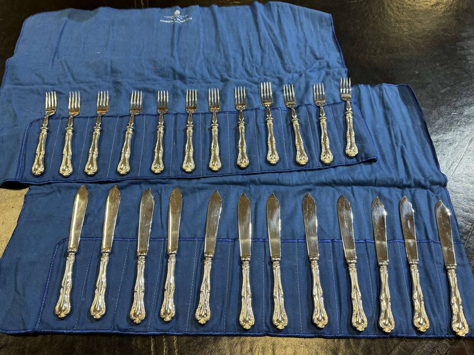 Service of 12 fish knives and 12 fish forks by Mappin and Webb.