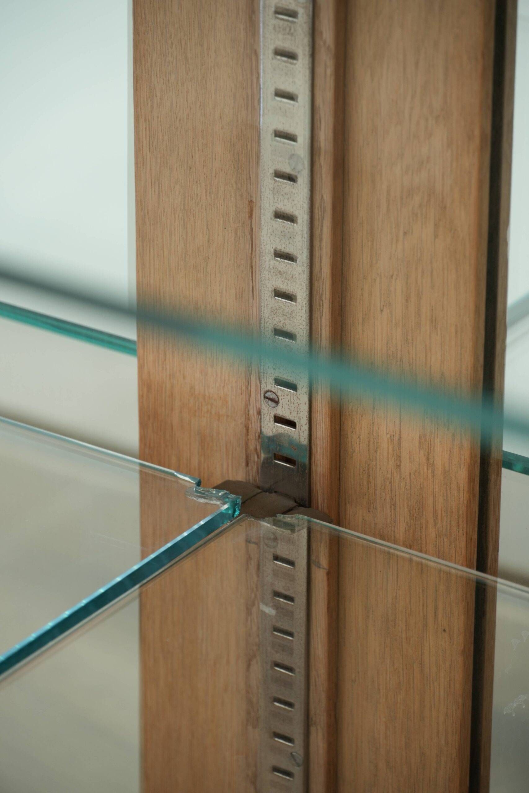 Antique Dutch oak display cabinet with glass shelves and a mirrored back