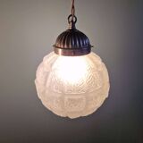 Art Deco trio of frosted glass pendants, 1920s-30s.