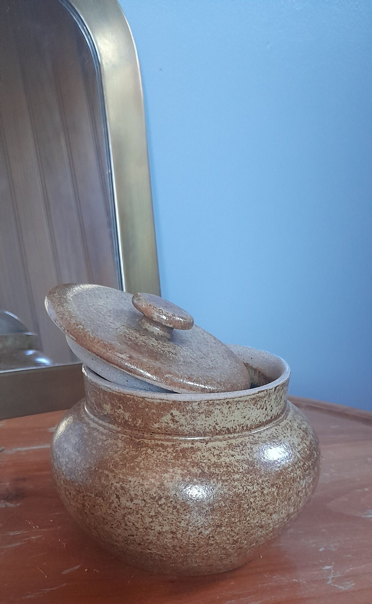 Old salt pot in sandstone, with lid