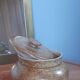 Old salt pot in sandstone, with lid