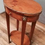 Oval marquette side table