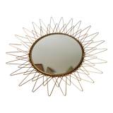 Sun mirror in gilded metal