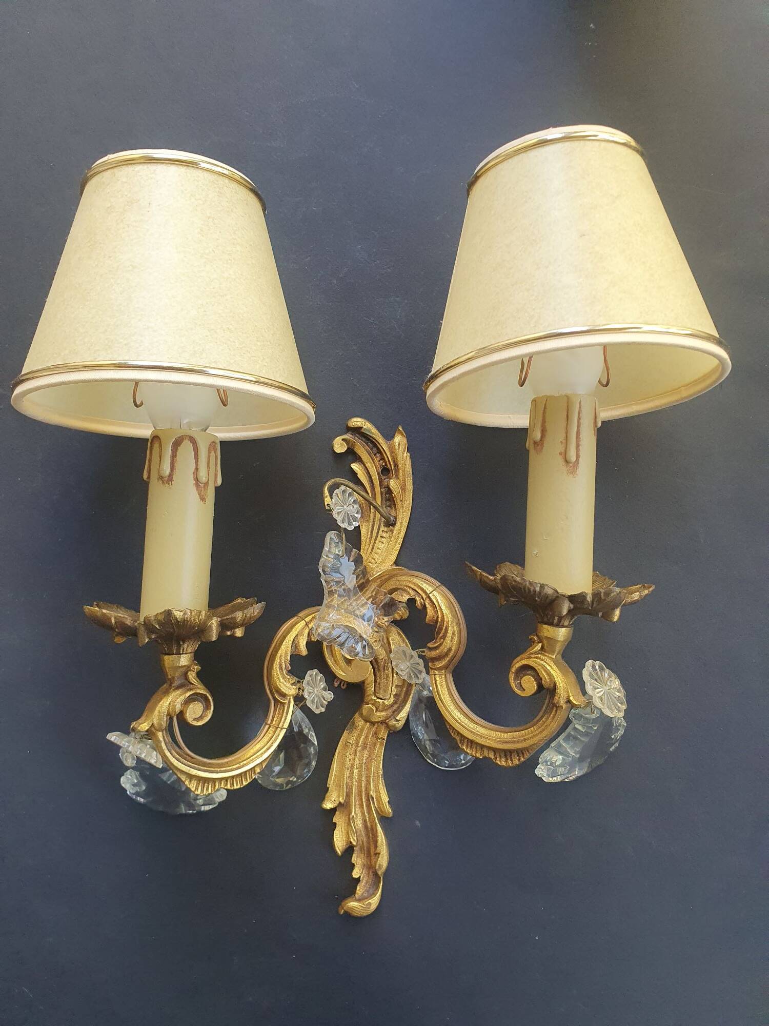 Pair of wall sconces candle holders with antique pendants