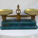 old enameled kitchen with its weight scale